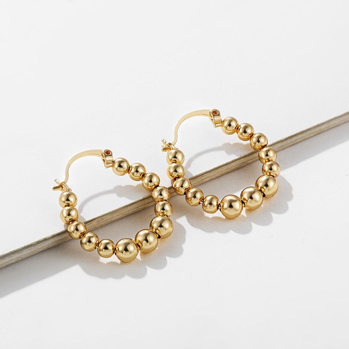 Minimalist Geometric Twist Hoop Earrings